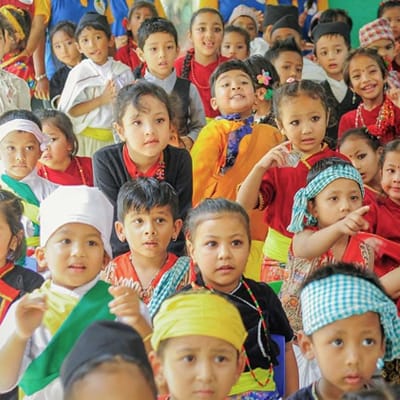 Children dressed in traditional attire for Lovely Home's cultural day celebration